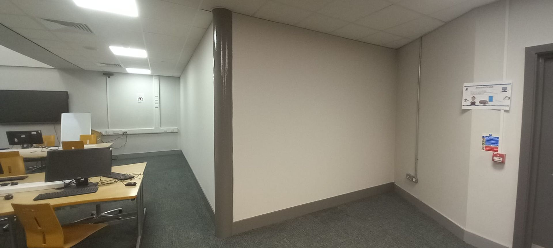Education sector – grey accent column and neutral walls coated during holiday closure, ensuring no disruption to term-time