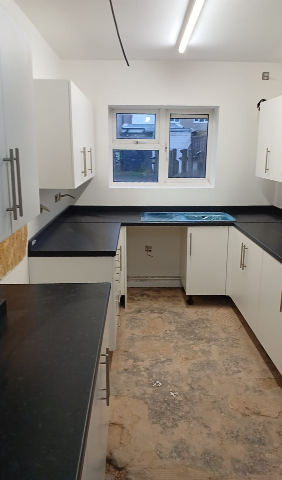 Social housing kitchen upgrade – moisture-resistant paints delivered efficiently for improved resident comfort