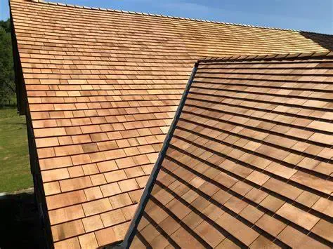 A close up of a wooden roof on a house.