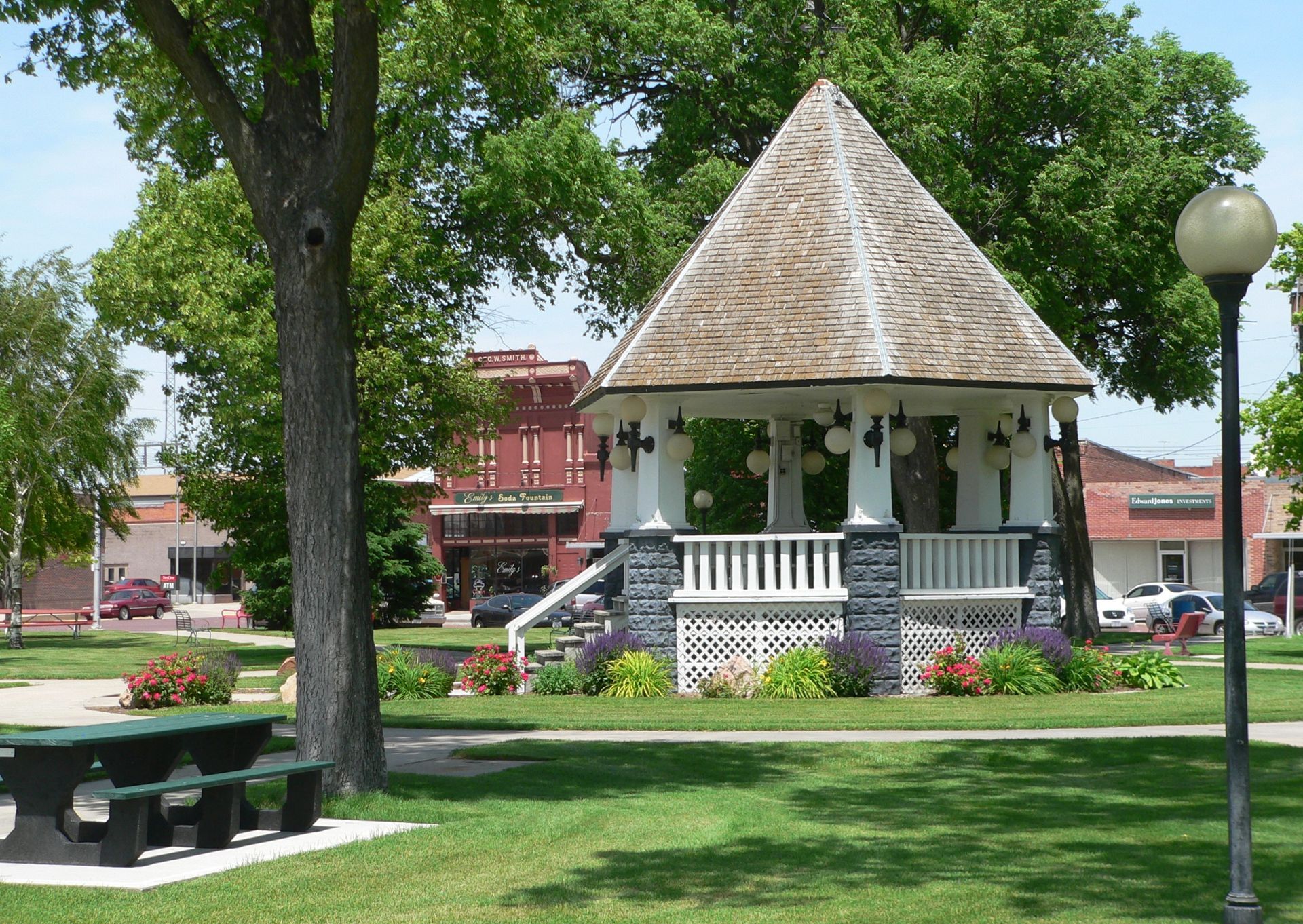 Residential and Commercial Garage Doors in Broken Bow, NE A gazebo in a park with a picnic table in front of it