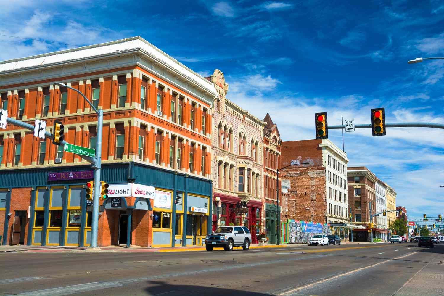 Commercial and Residential Roofing Services in Cheyenne, Wyoming A street corner in a small town with a lot of buildings and traffic lights.