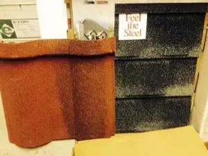 Granulated Metal Panels A red tile next to a black tile that says feel the steel