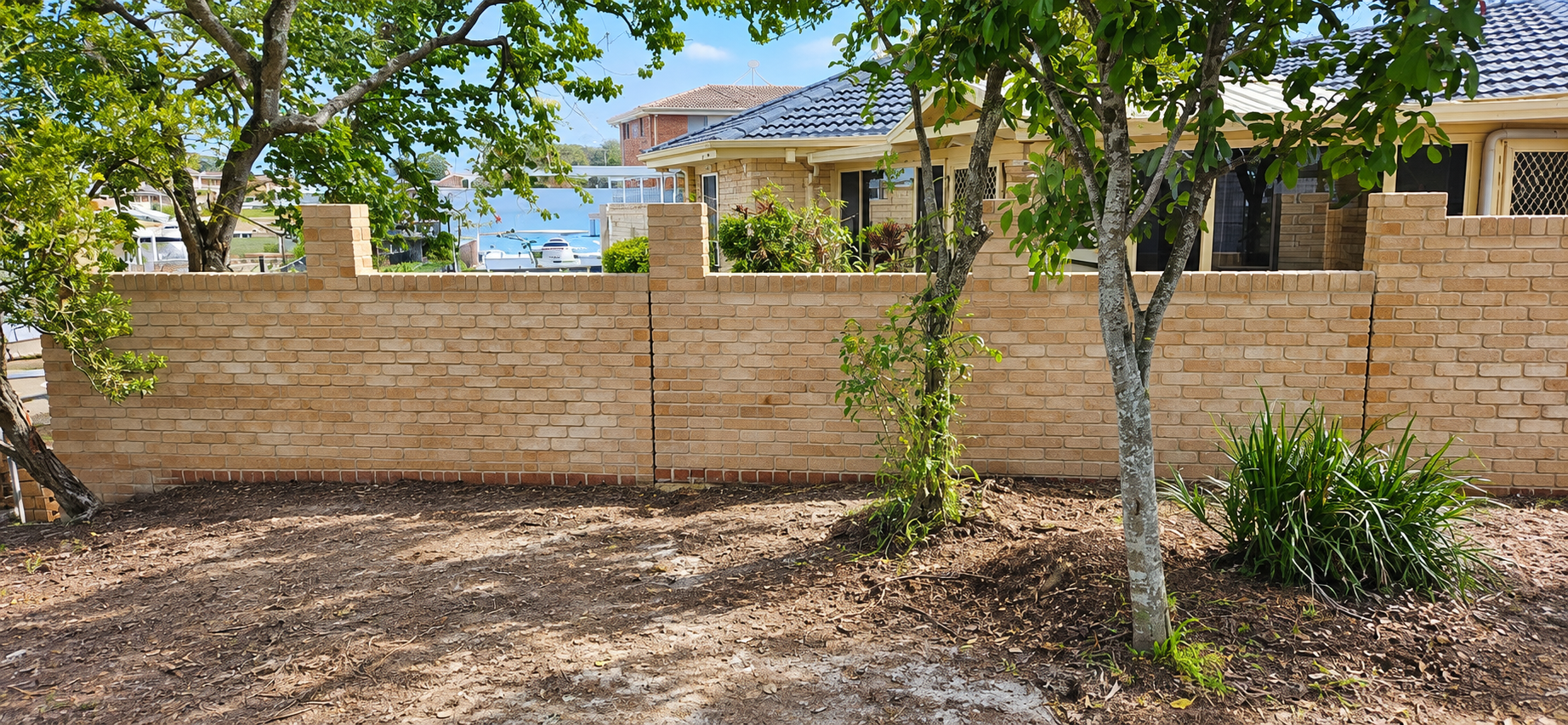 House with Brick Fence — Millers Masonry In Taree, NSW