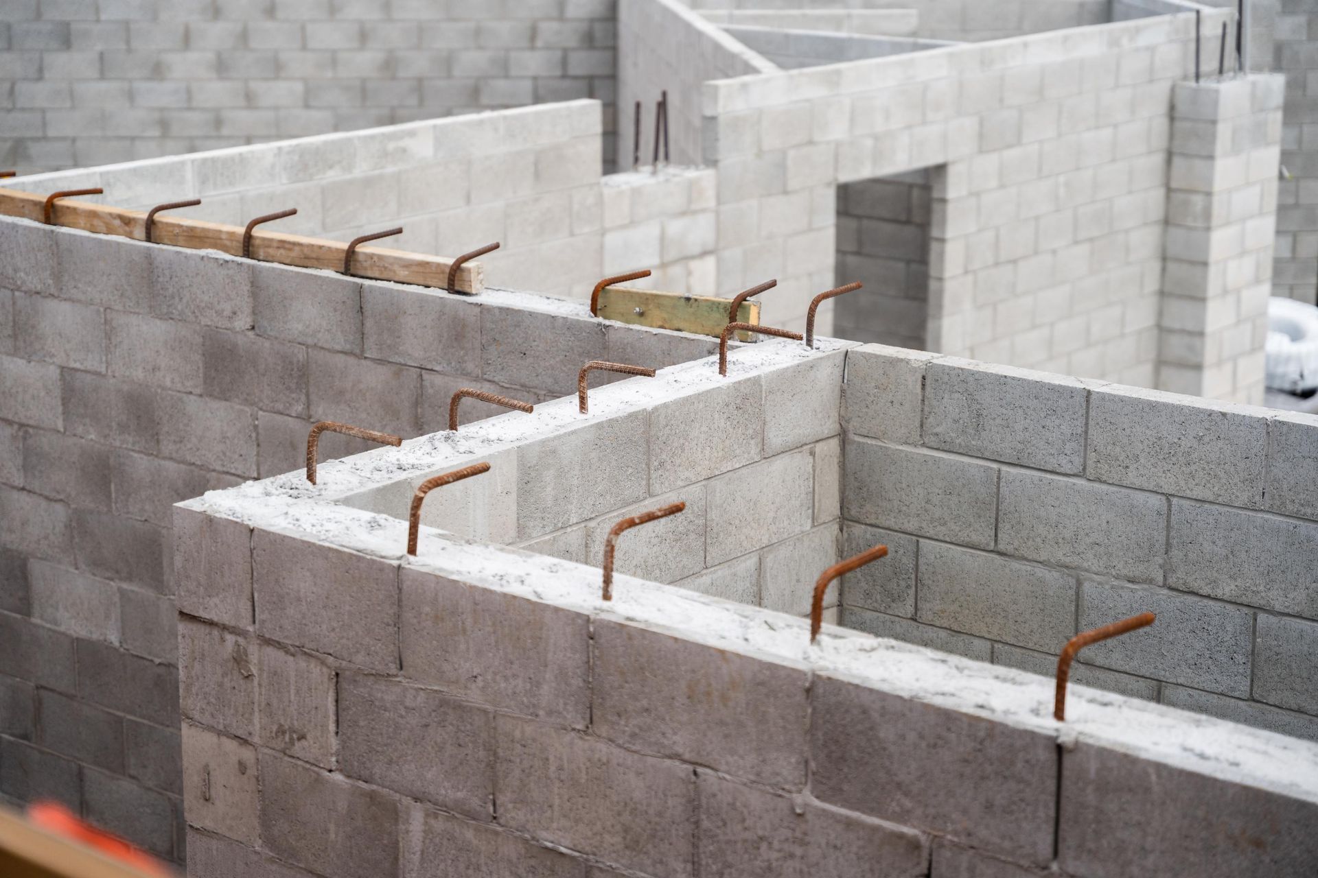 Concrete block walls under construction with rebar — Millers Masonry In Port Macquarie, NSW