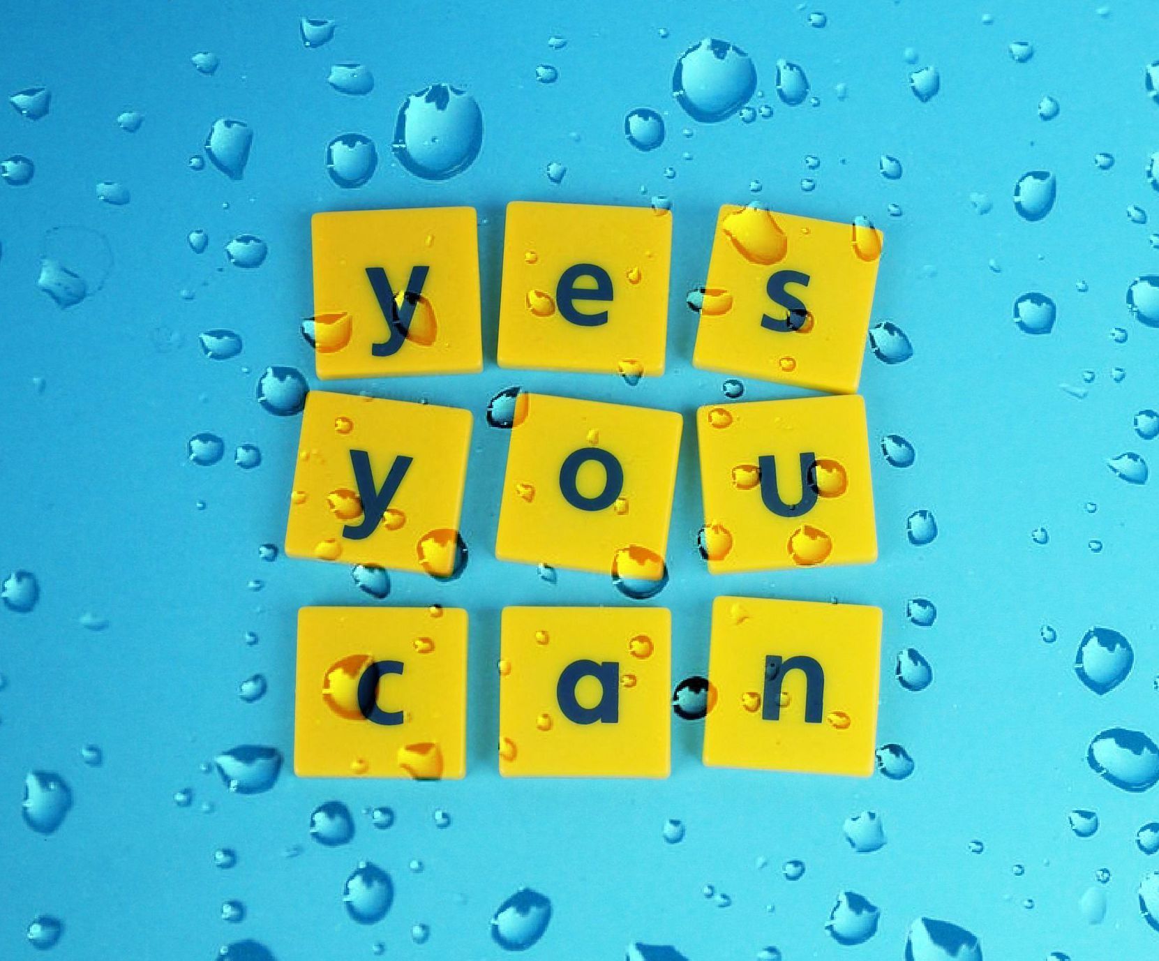 Yellow tiles spelling 