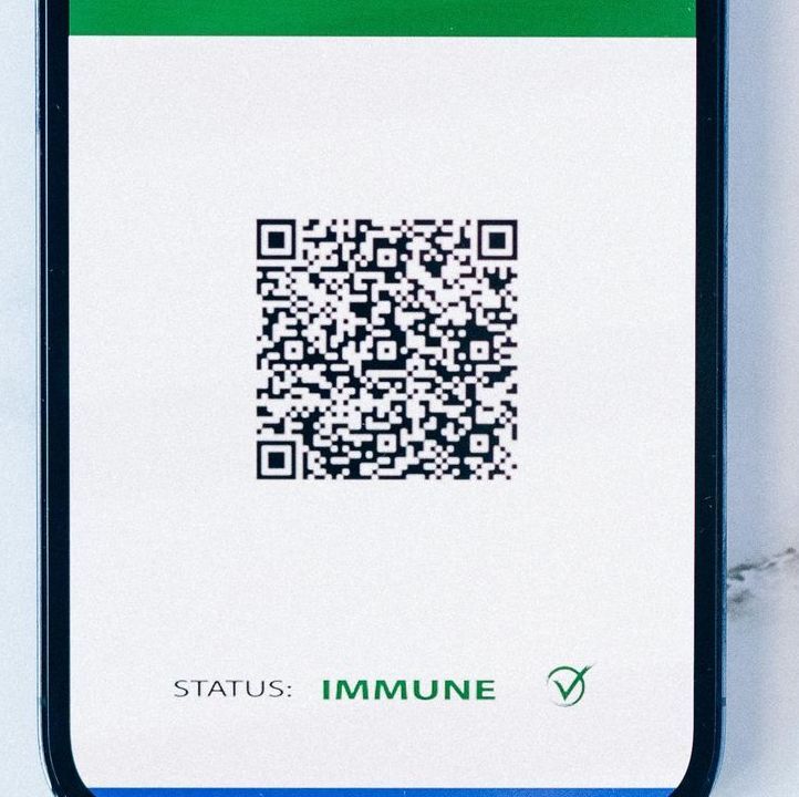 Digital immune status card with a QR code, labeled 