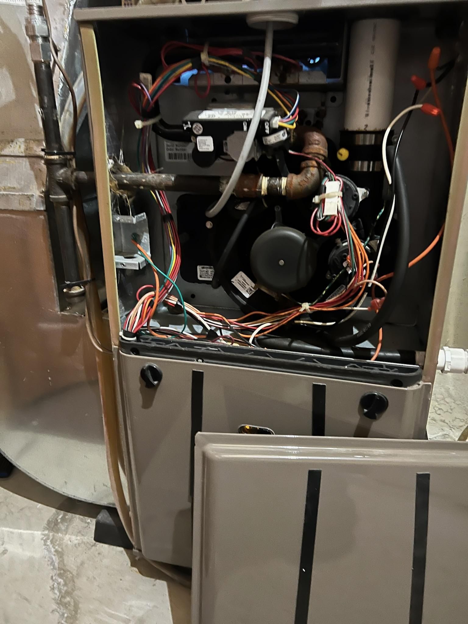 A White And Black Heater - Normal, IL - Schulz Heating & Cooling A White And Black Heater - Normal, IL - Schulz Heating & Cooling