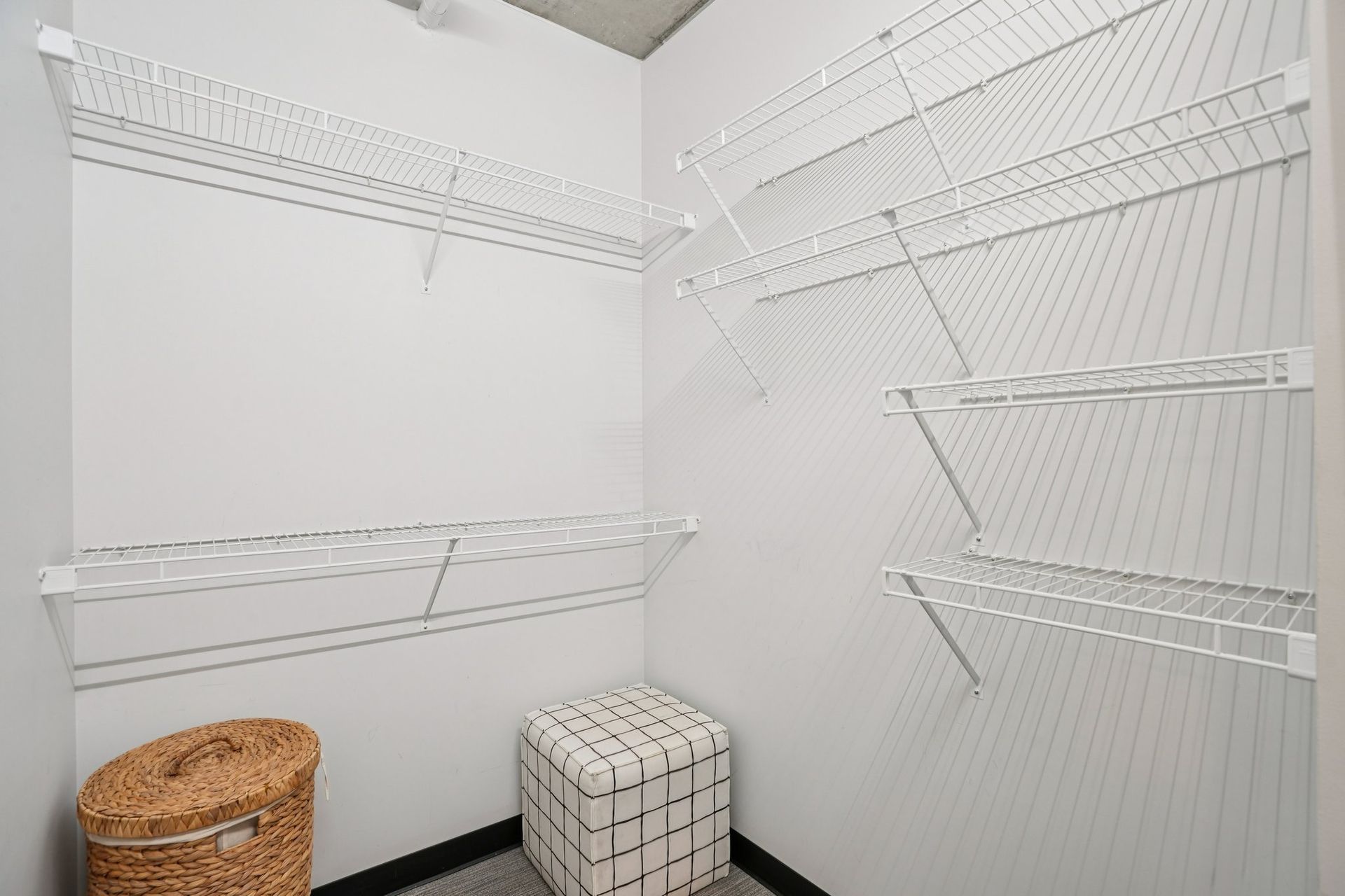 Modern bathroom with bathtub, vanity, toilet, and large wall mirror