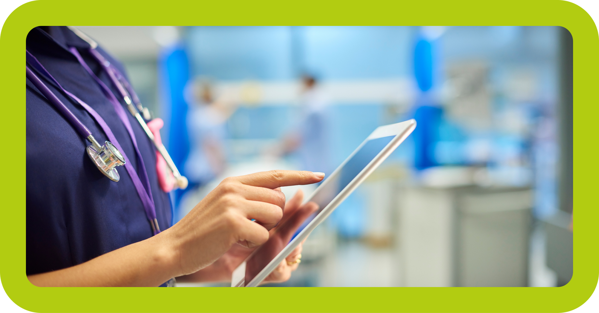 A nurse is using a tablet computer in a hospital room.