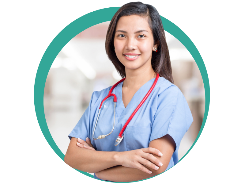 A nurse with her arms crossed and a stethoscope around her neck.