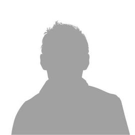 Una silhouette di un uomo senza volto su uno sfondo bianco.