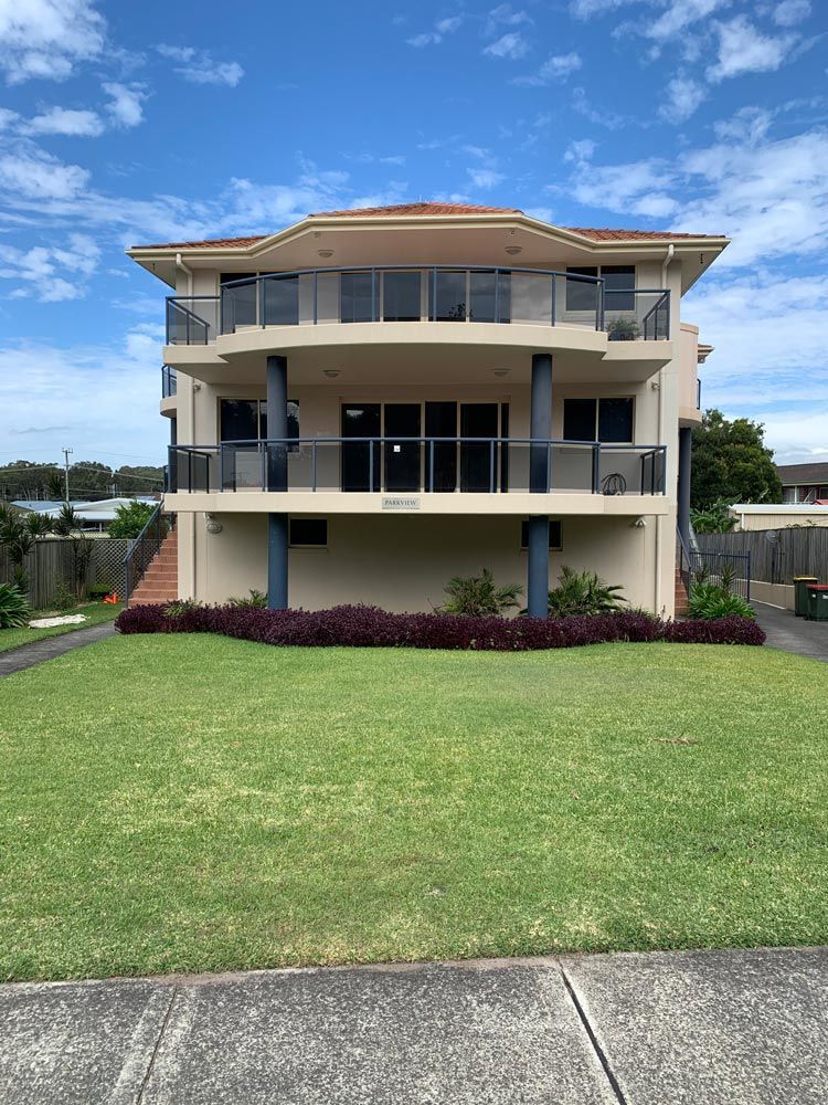Cream Colour Building — Painting in Forster