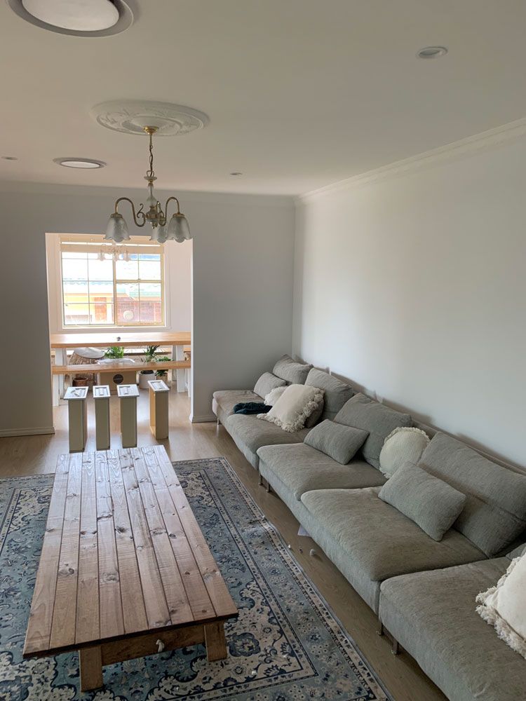 Living Room with Sofa — Painting in Forster
