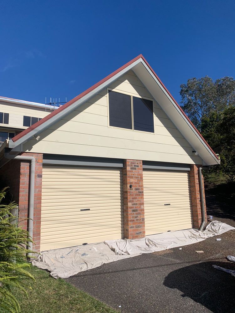 Garage with Two Rollup Doors — Painting in Forster