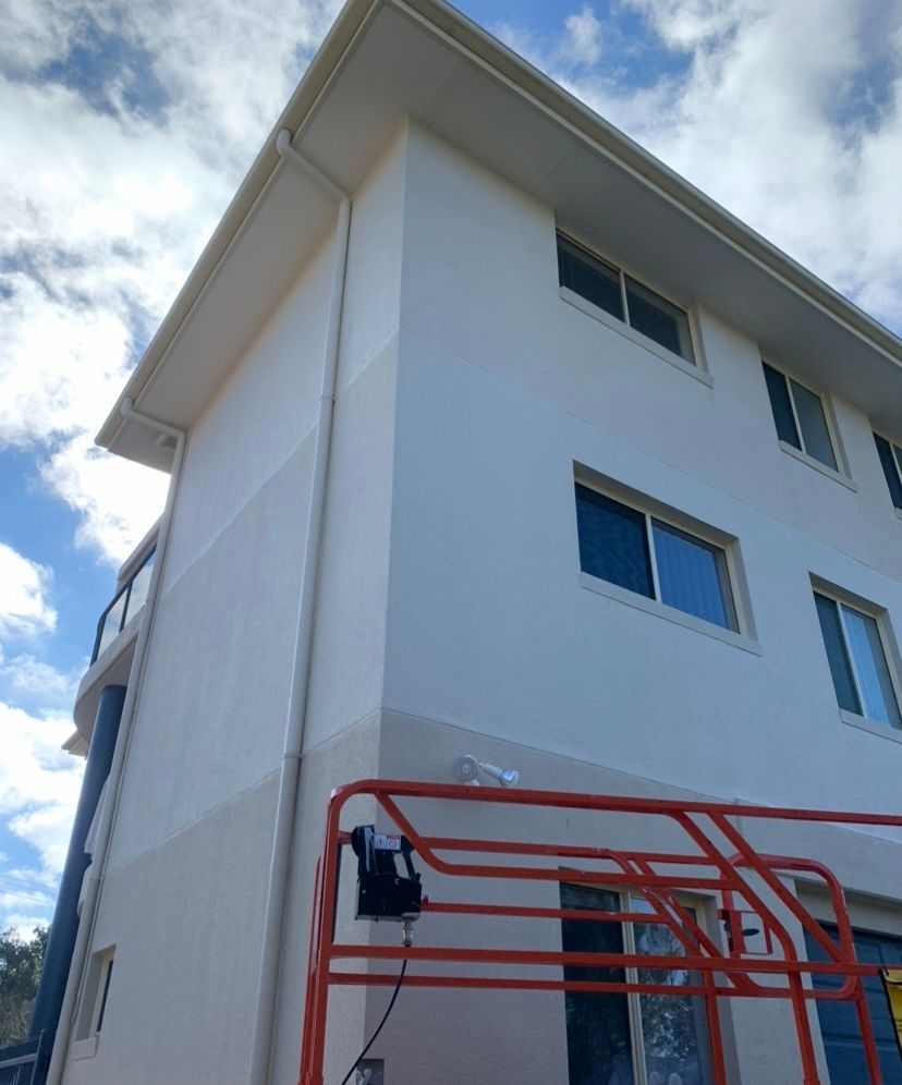 Painting Wall Red in Room Before and After — Professional Painting Service in Forster, NSW