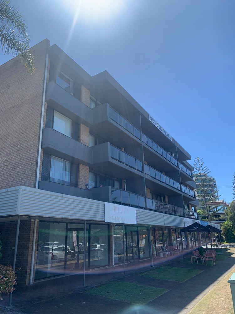 Sun Shining Over Building — Painting in Forster