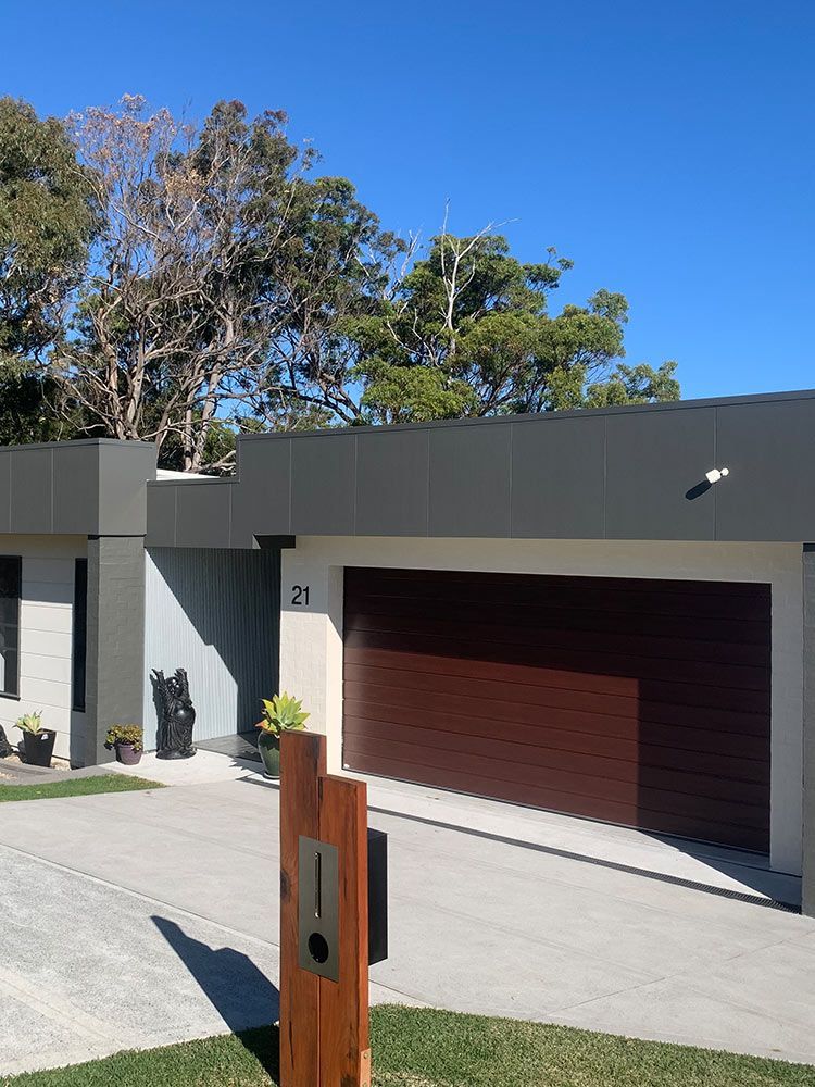 Brown Garage Door — House Painting in Forster
