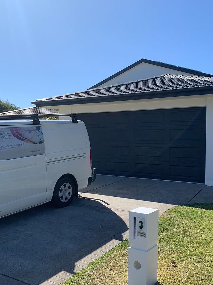 Dark Grey Garage Door — House Painting in Forster