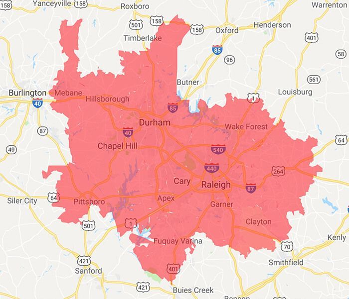 Pink/red shaded area over a map of the Raleigh-Durham, NC region, highlighting the metro area