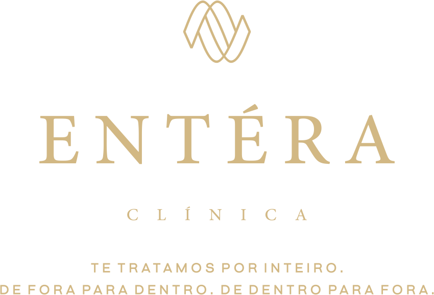 The logo for entera clinica is a gold logo on a white background.
