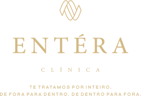 The logo for entera clinica is a gold logo on a white background.