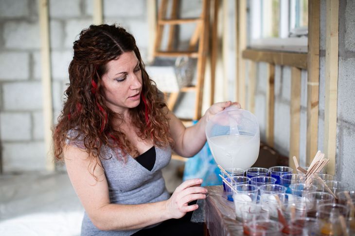 Celia Lancaster preparing resin materials in her studio