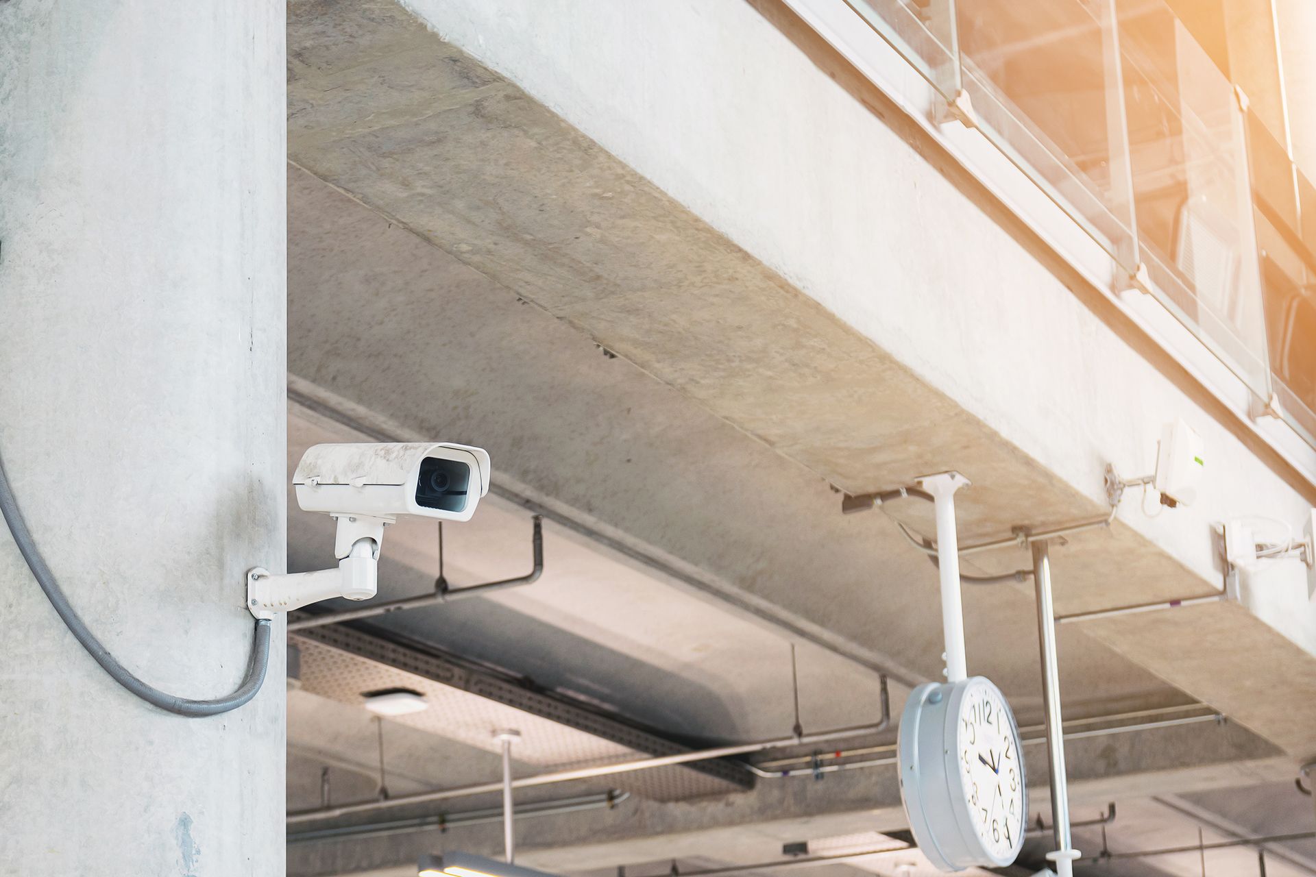 a security camera attached to the side of a building