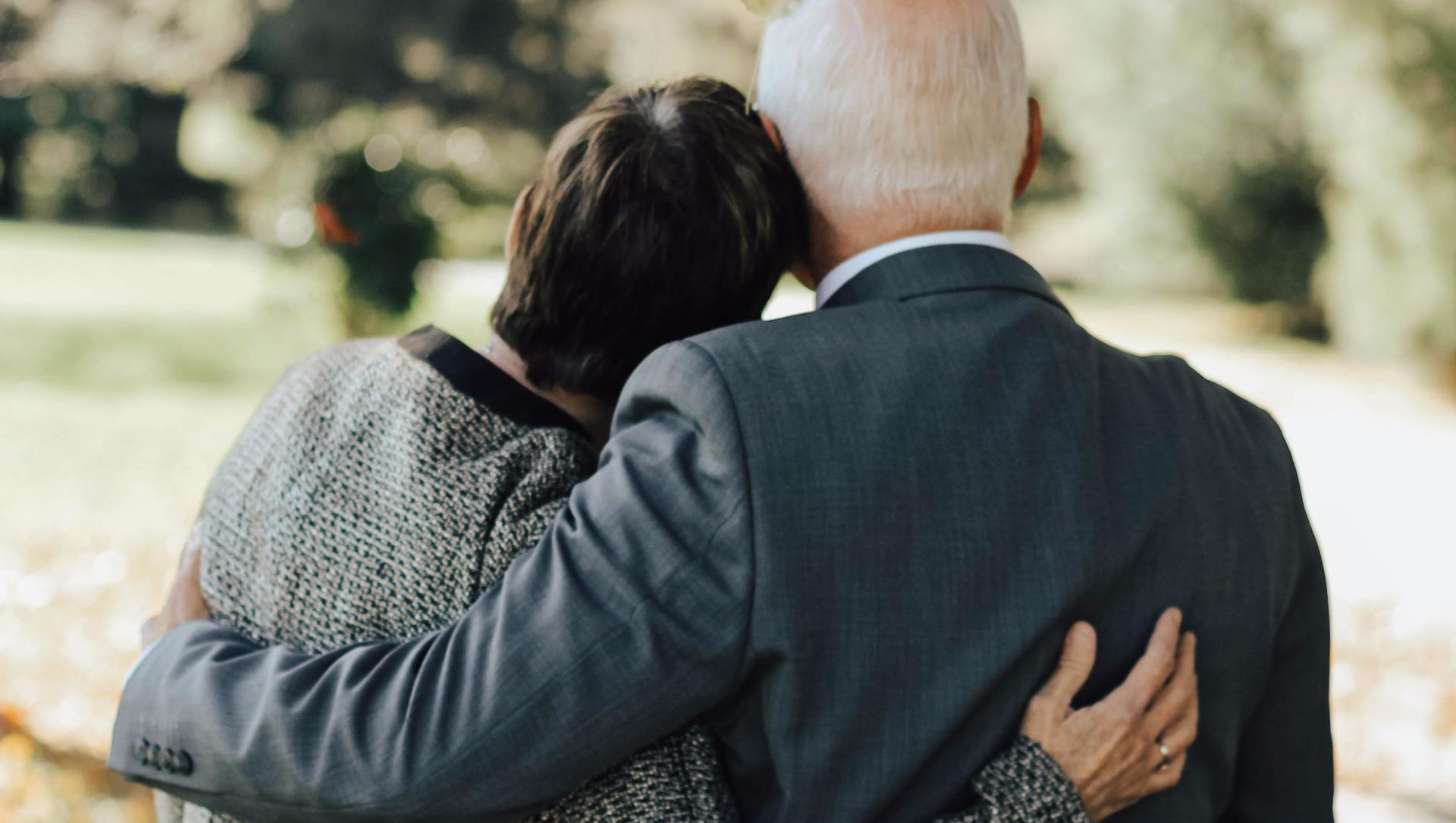 Grieving couple at a funeral service