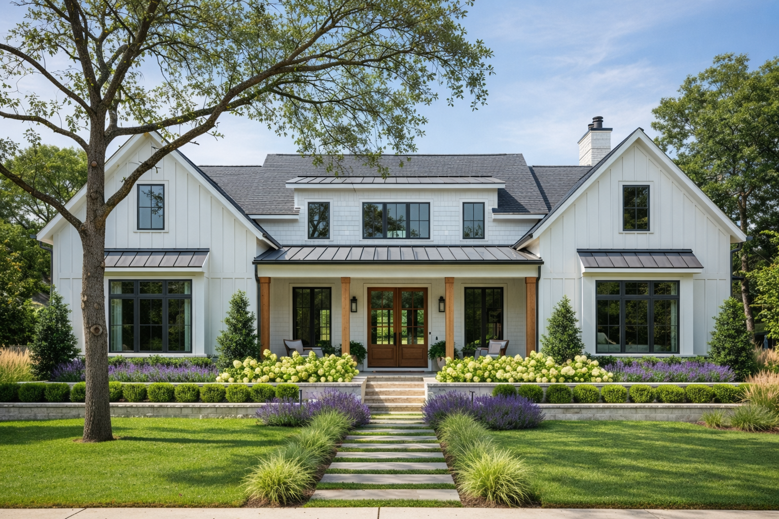 A white farmhouse with a gabled roof and a flagstone path leading to the front door, surrounded by a lush green lawn