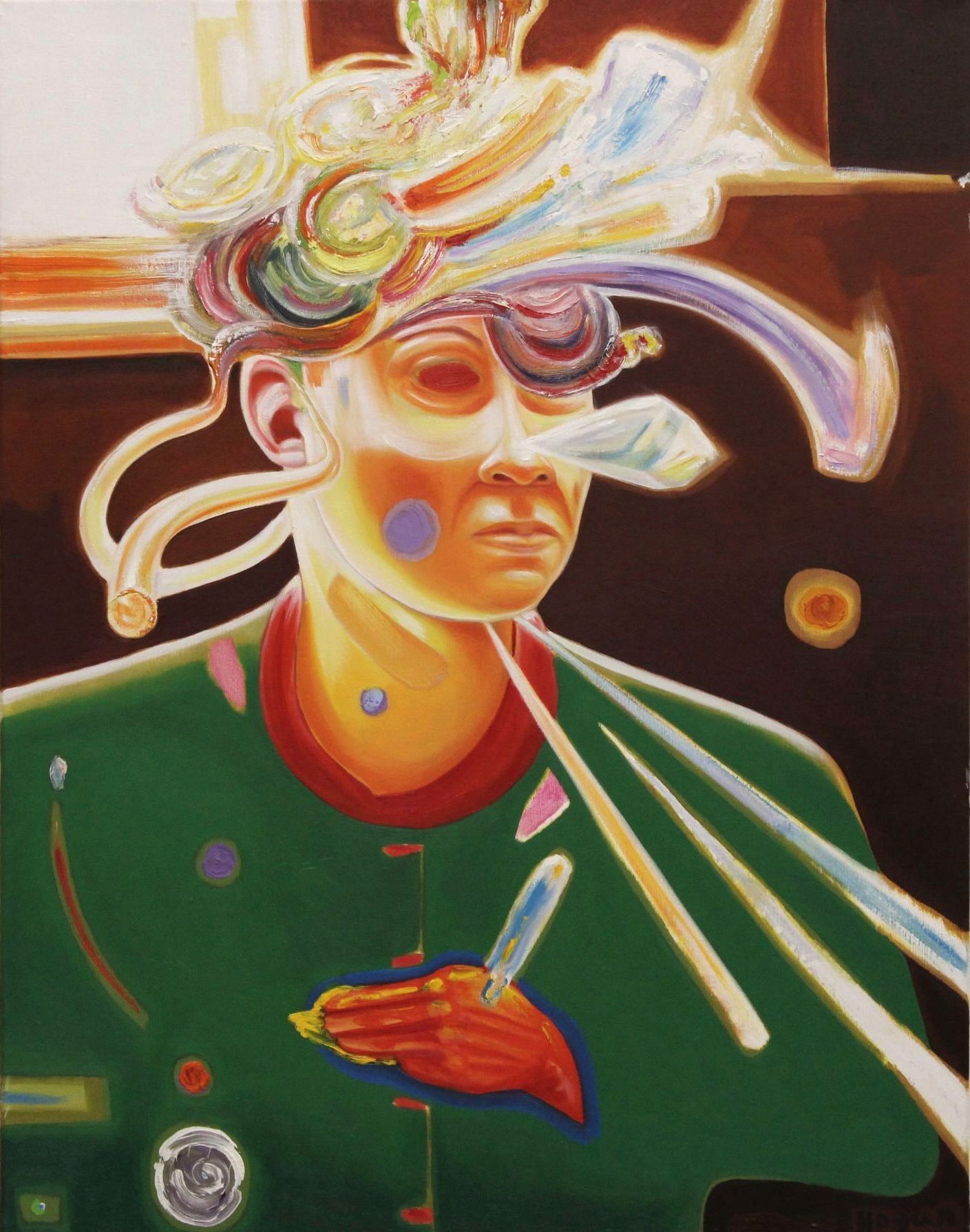 Portrait of a person with colorful headgear and green jacket, holding a small object with a red hand.