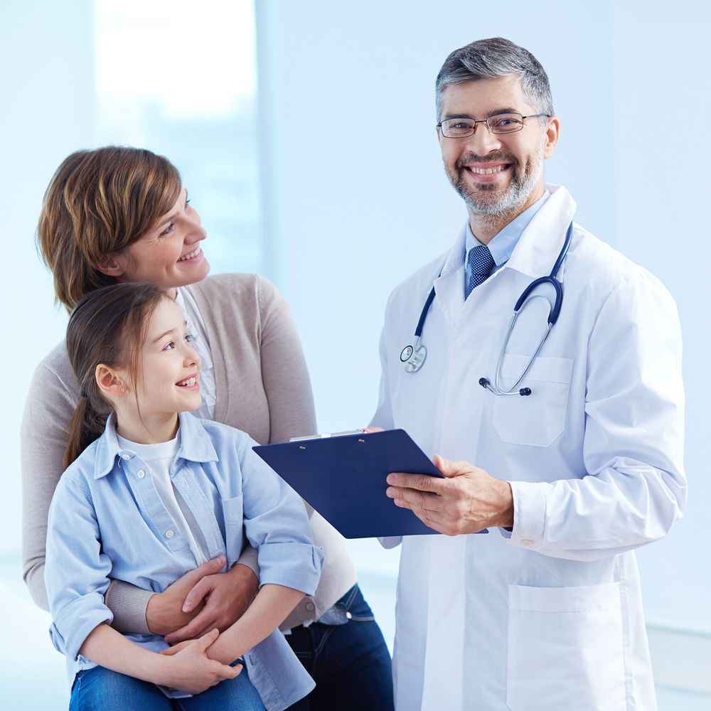 Happy Doctor Holding a Clipboard