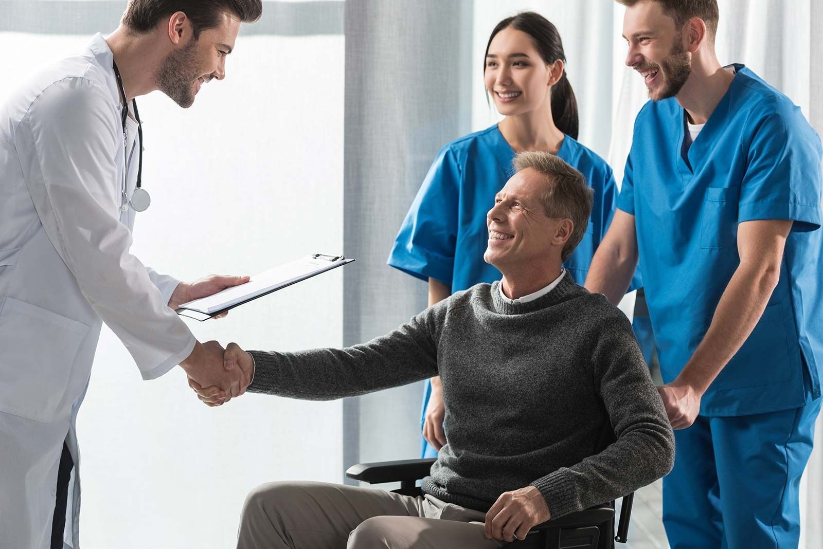 Doctor Shaking Patient's Hands Doctor Shaking Patient's Hands
