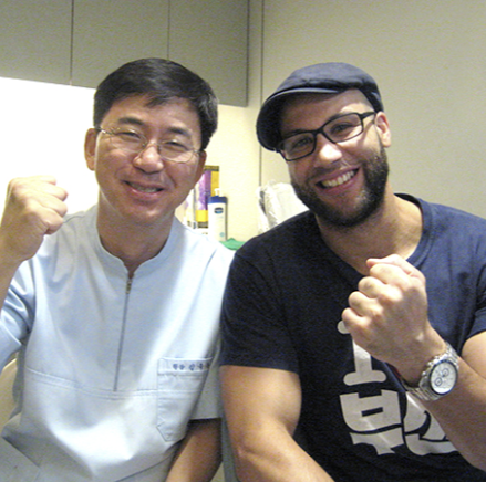 A Plus dentist with a happy international patient