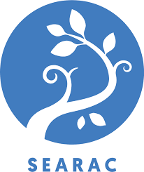 The SEARAC logo: a stylized white tree branch with leaves inside a blue circle, with the text