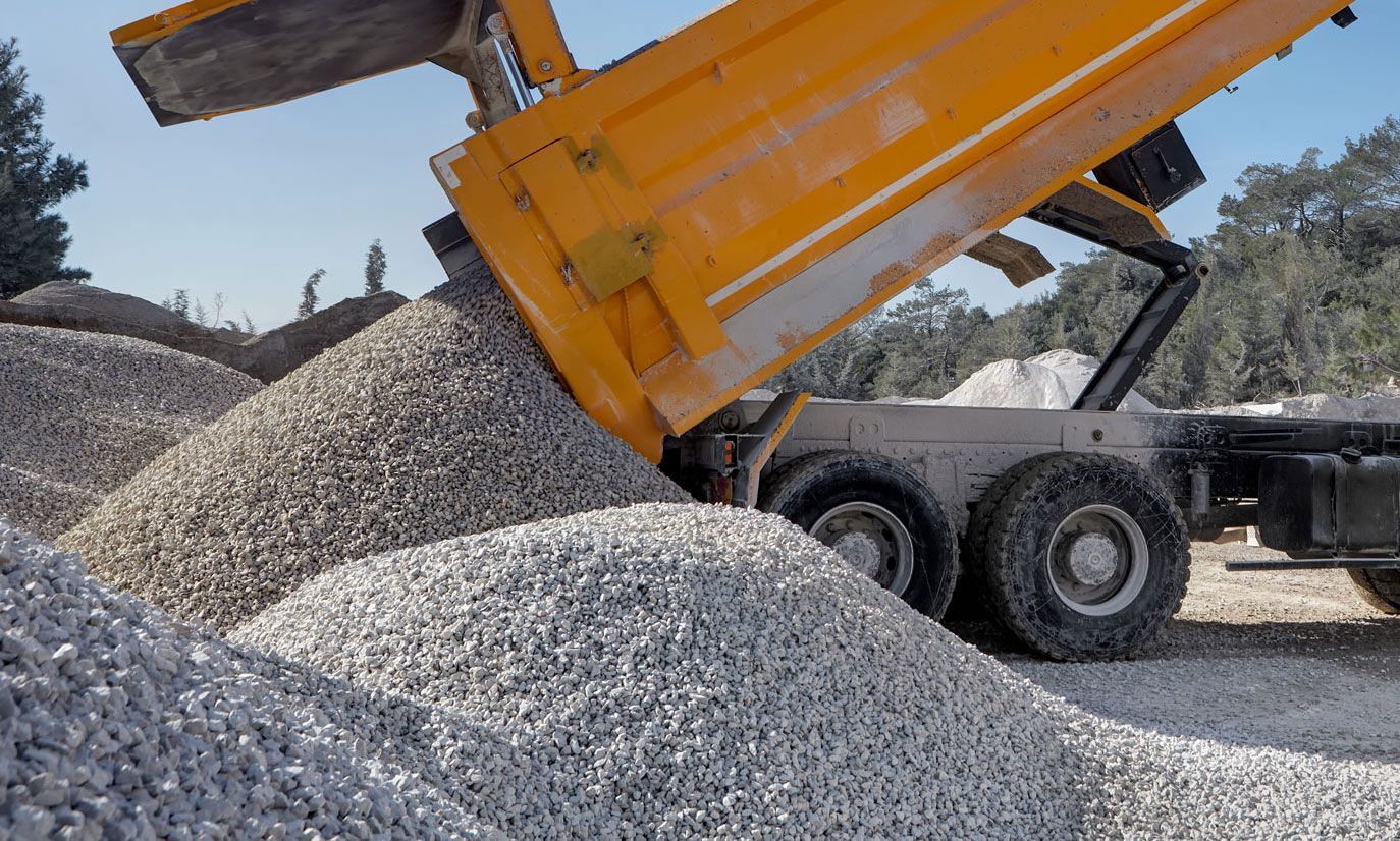 dump truck unloading gravel