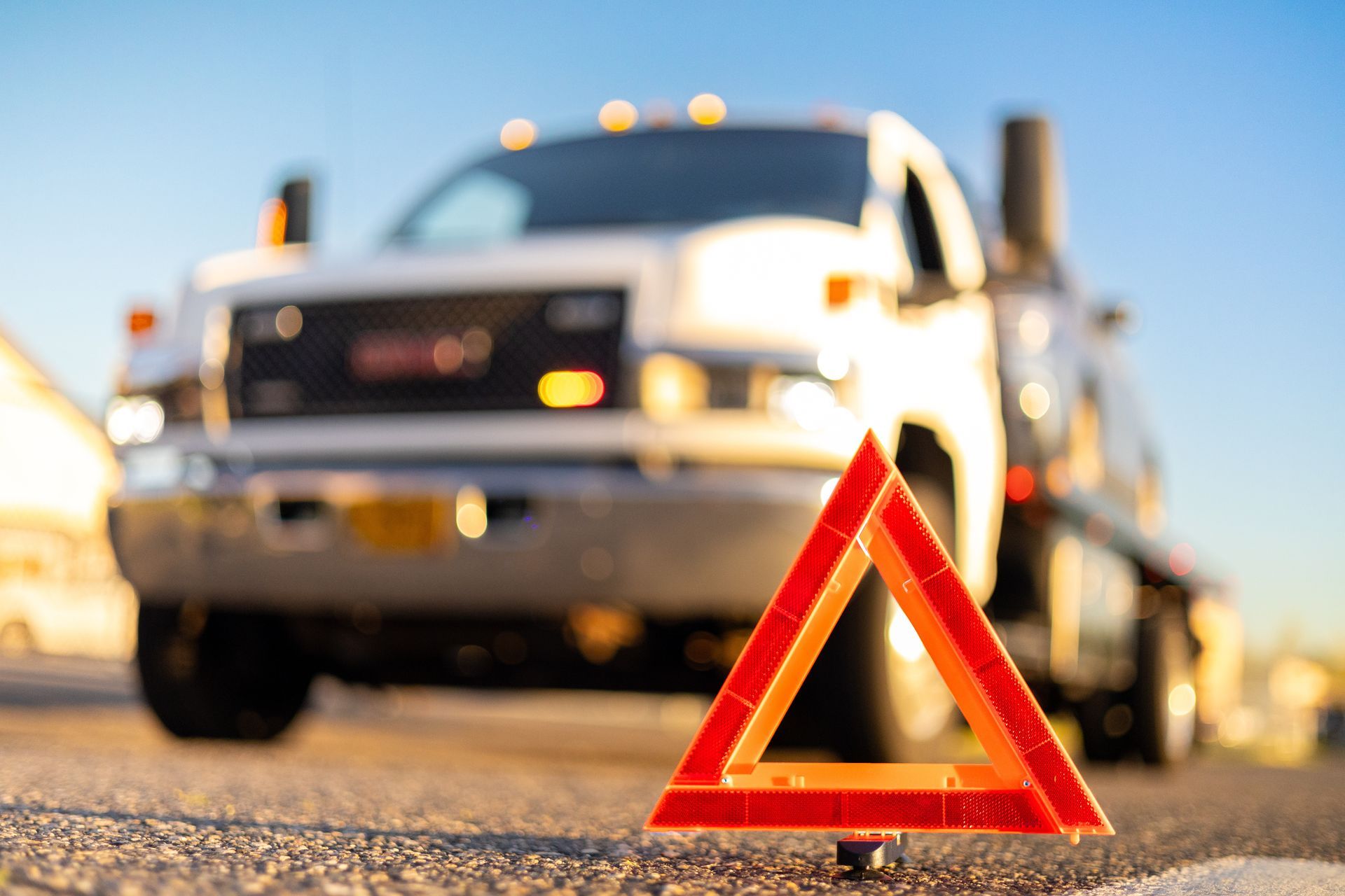 Roadside assistance vehicle provides emergency help to a stranded car.