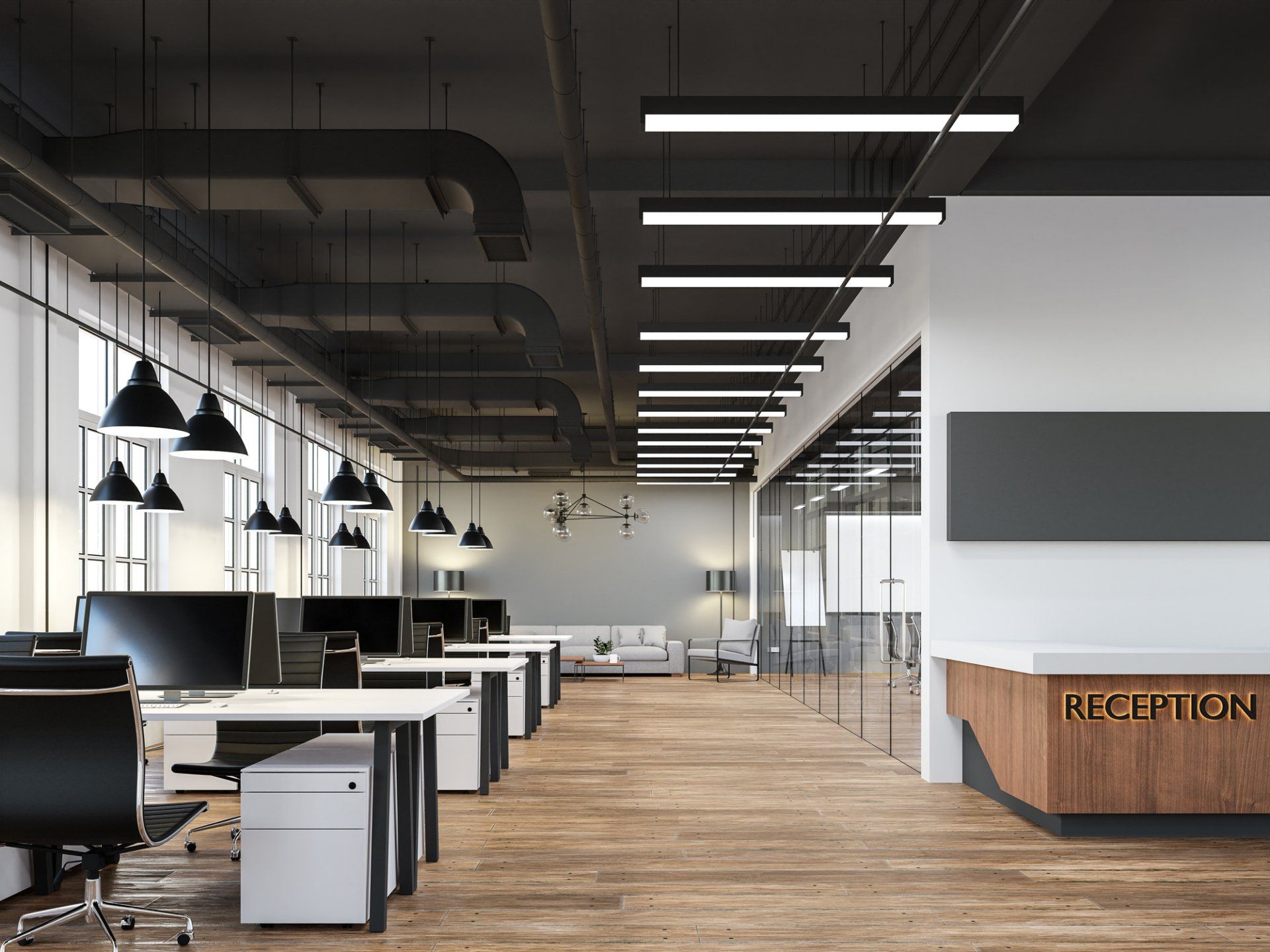 There is a reception desk in the middle of the office.