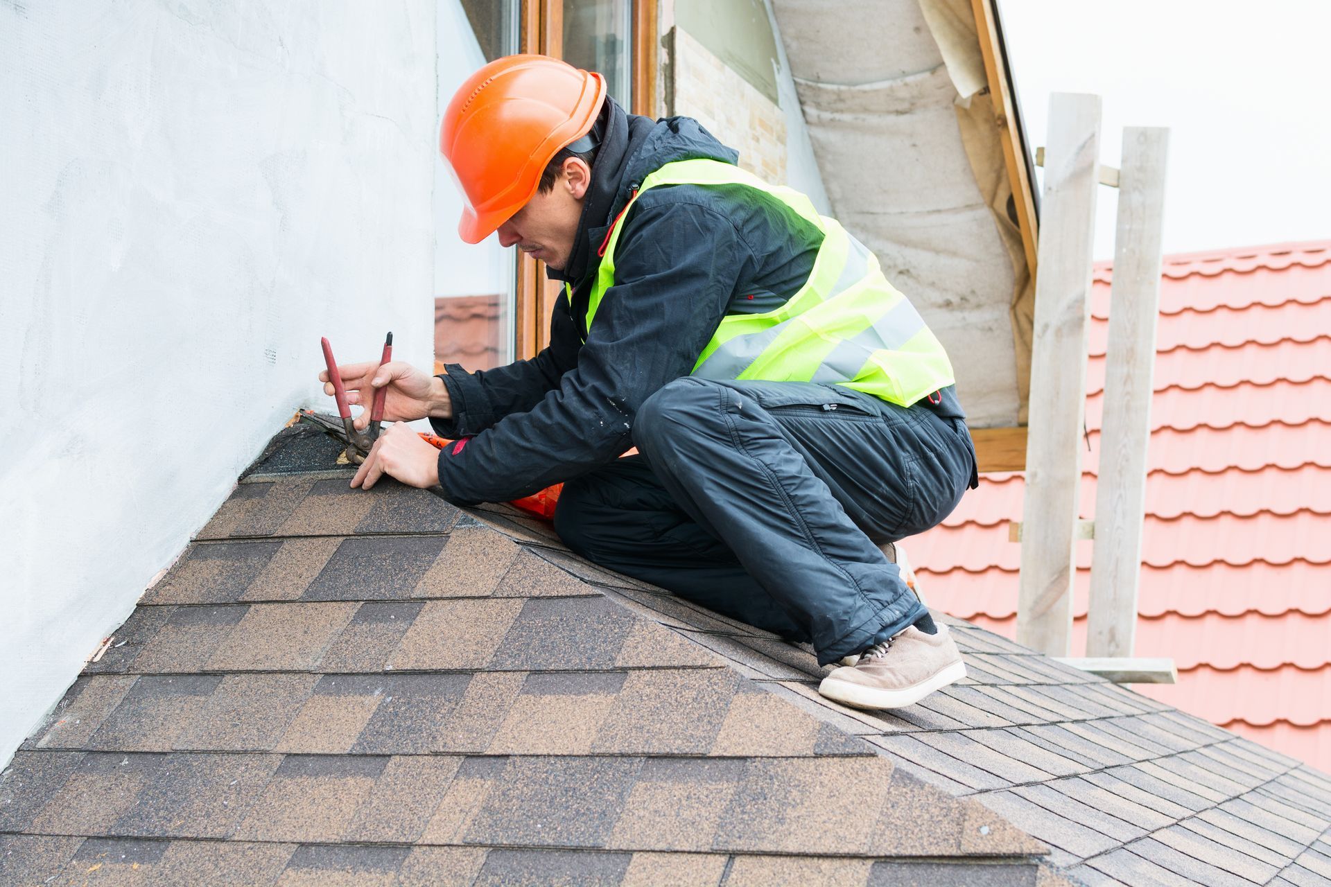 Roberts Roofs doing a roof repair