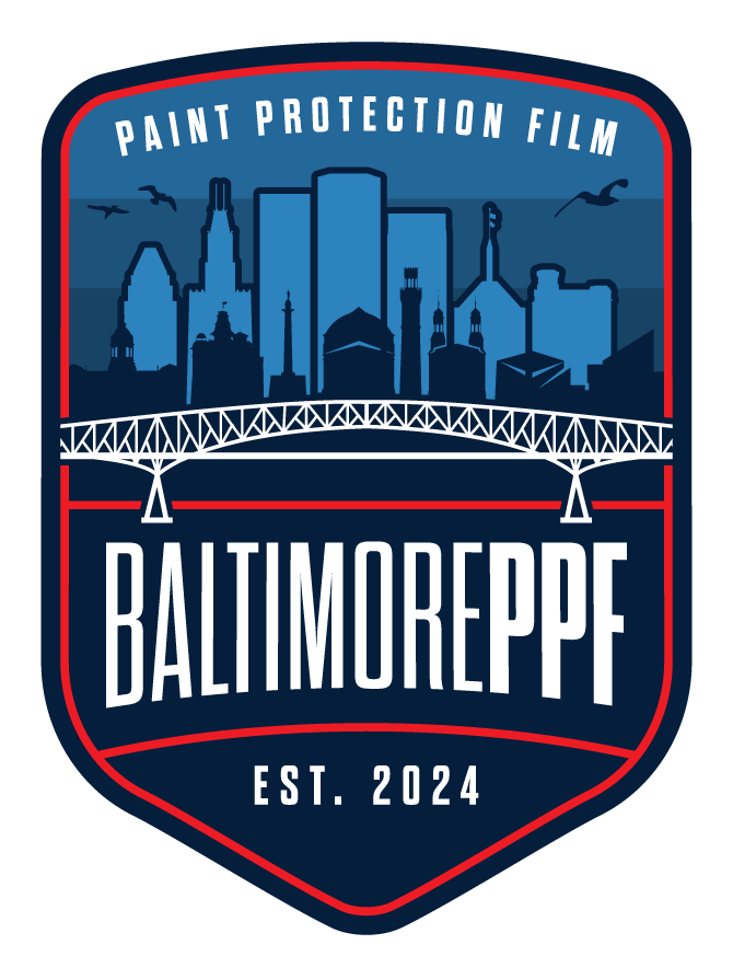 Logo for Baltimore PPF, Paint Protection Film. Blue skyline, bridge, and text on a badge-shaped background.