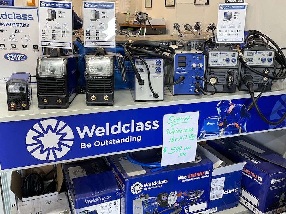Welding equipment display on a shelf with a