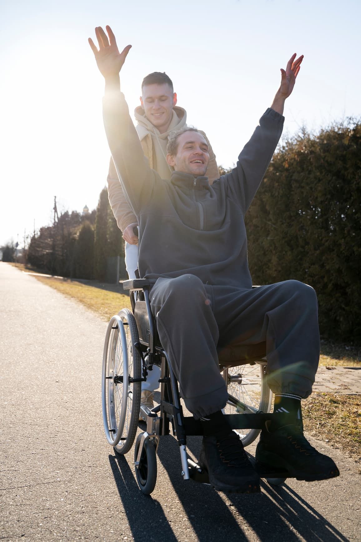 A person being pushed in a wheelchair
