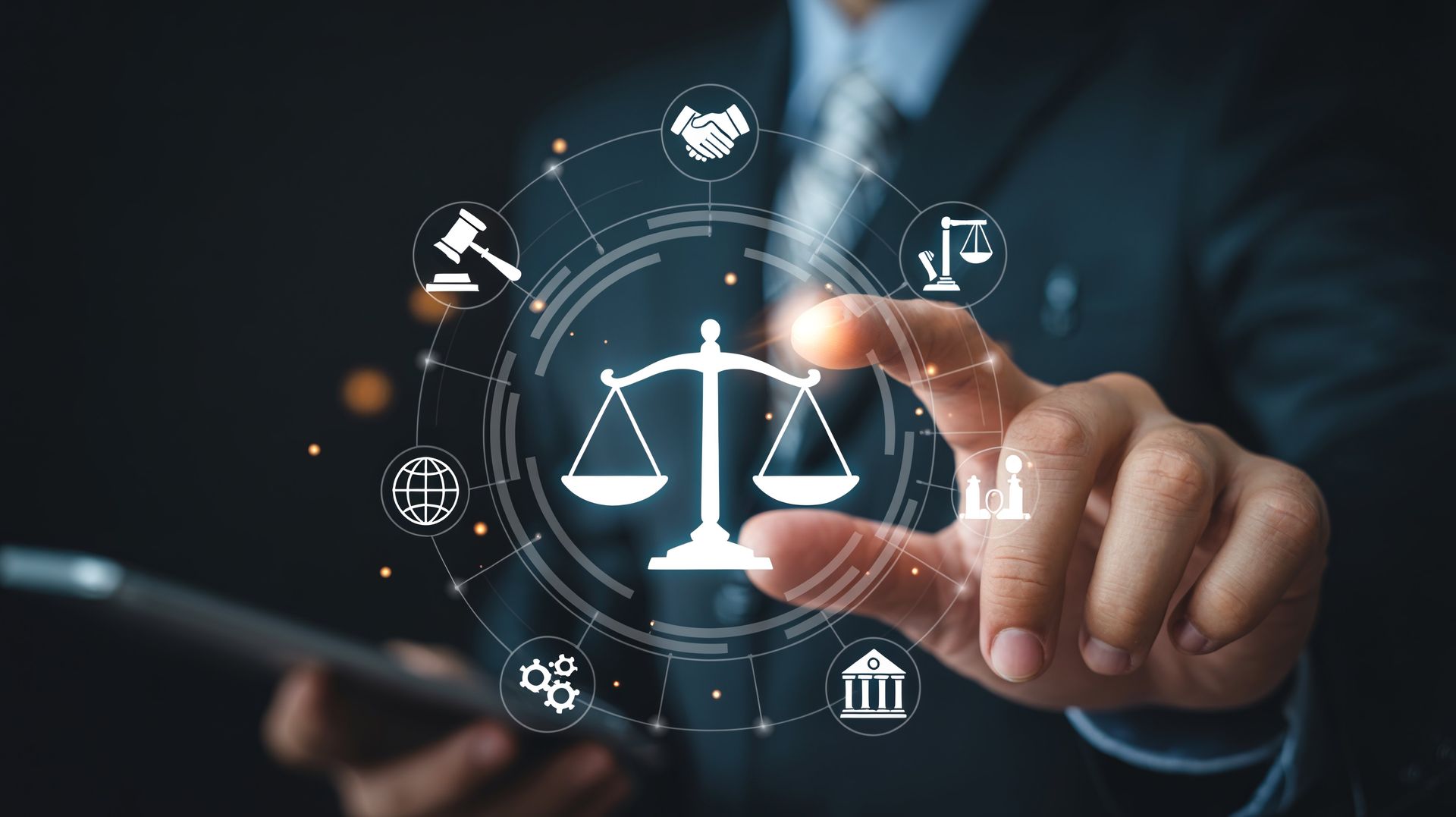 Businessperson tapping digital scales of justice on a dark interface, symbolizing legal technology.