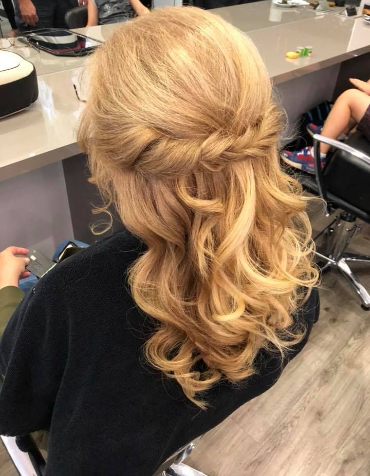 Brown Hair With Highlights, Styled in Layers, Seated in a Salon Chair — Artistry Of Hair in Kanimbla, QLD