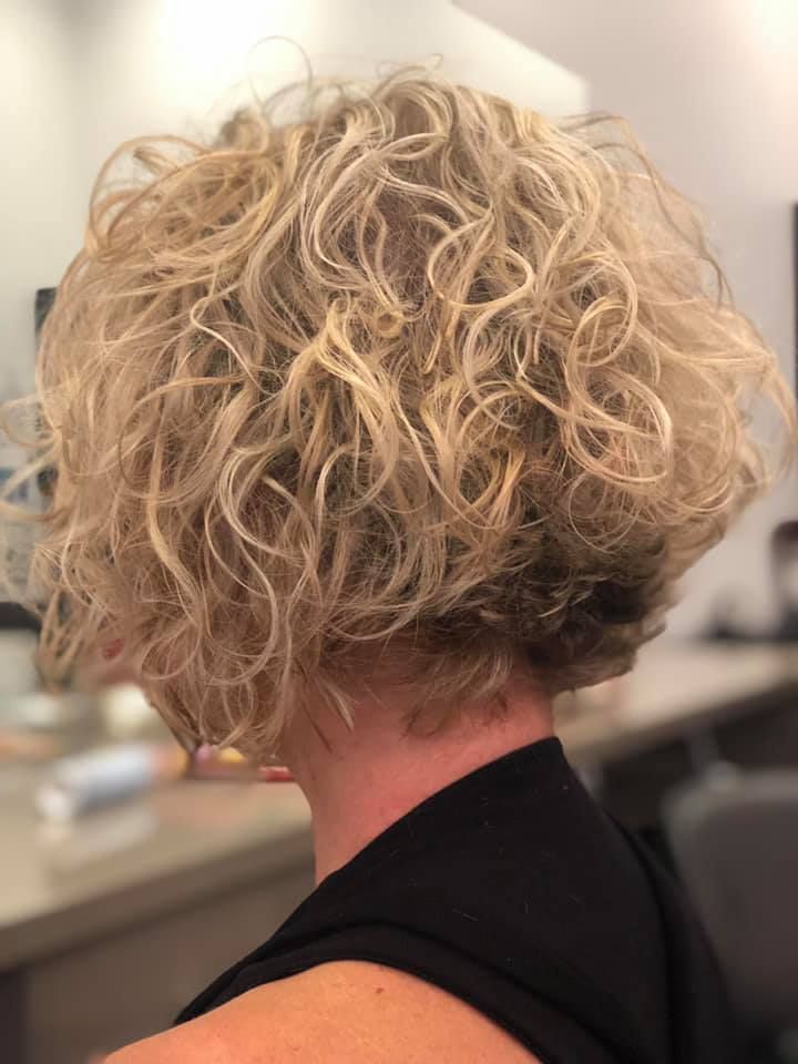 Blonde Curly Hair Bob Hairstyle, With the Back of a Person's Head — Artistry Of Hair in Kanimbla, QLD