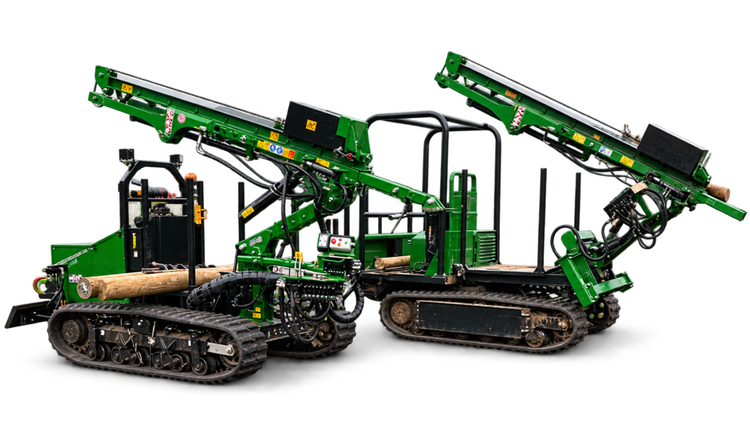 Two green tracked forestry machines with booms on a white background