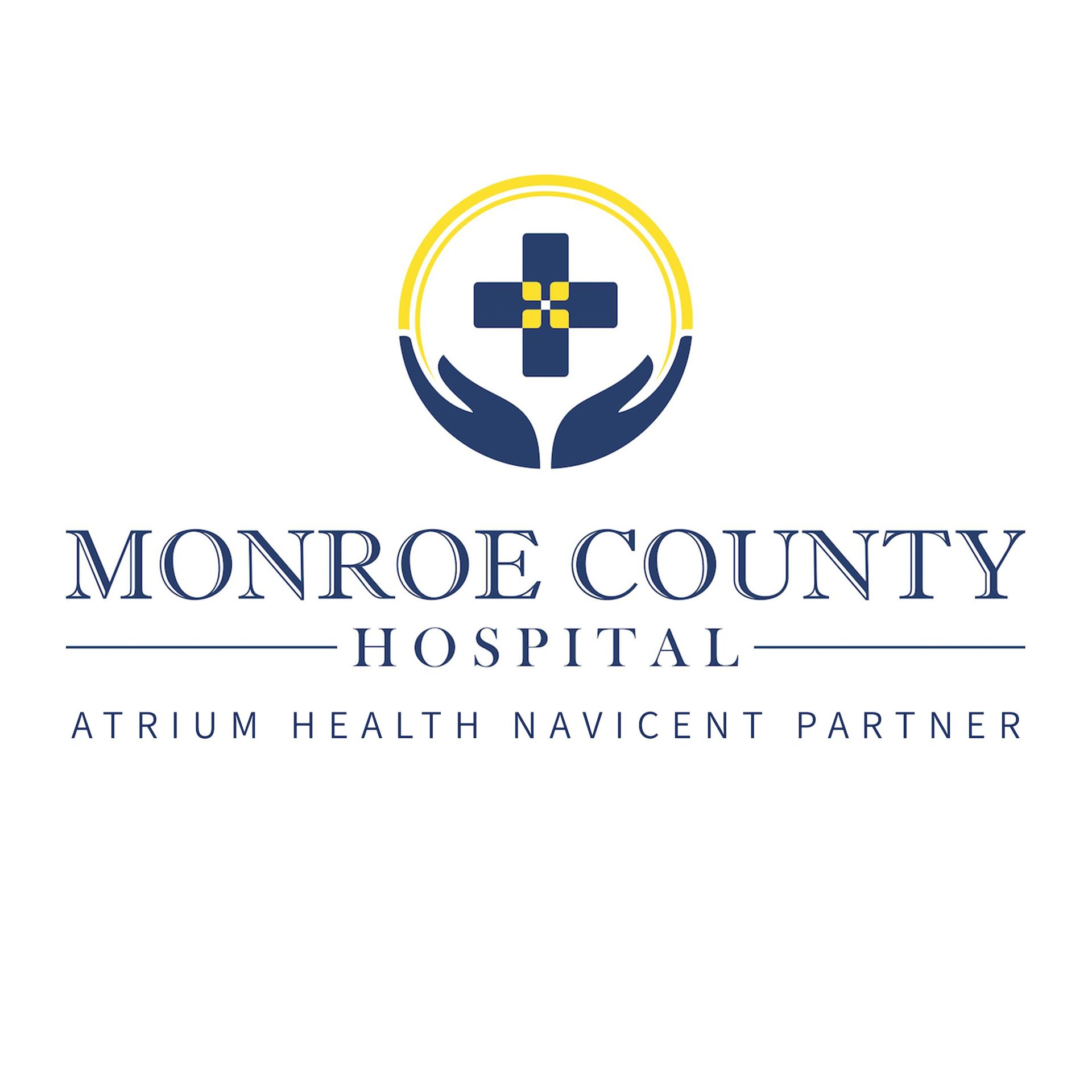 Monroe County Hospital logo with blue-and-gold medical emblem and Atrium Health Navicent Partner text