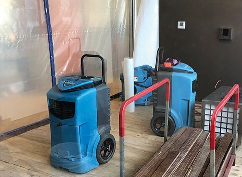 Mold remediation equipment in containment area.