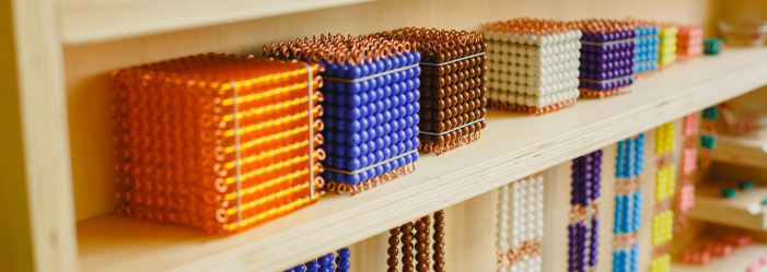 What a shelf looks like in a montessori classroom.