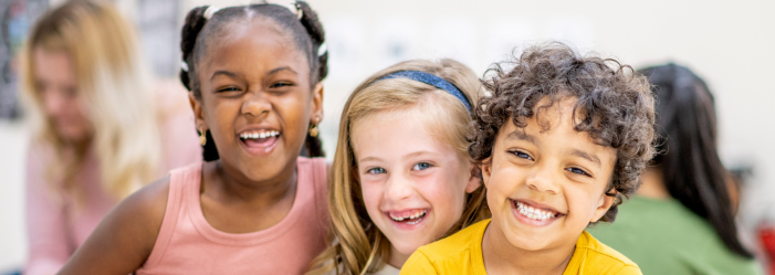 Effective Montessori Time Management for Kids - Smiling Kids in a Classroom Setting
