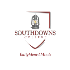 Southdowns College logo with lantern emblem and motto “Enlightened Minds”
